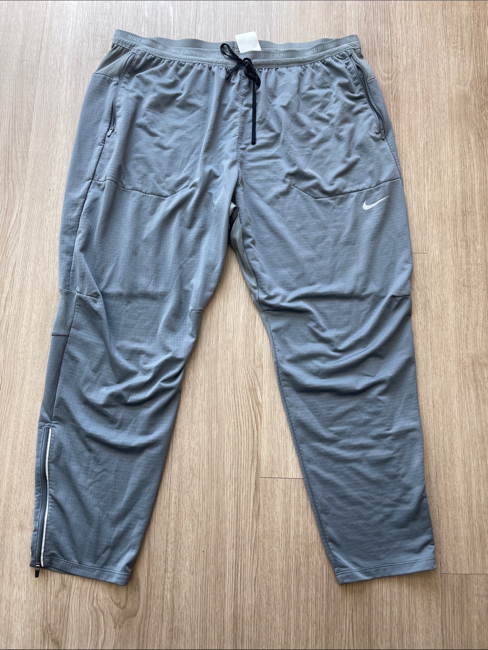 Nike Men’s Light Gray Athletic Joggers with Zip Ankles